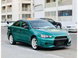2015 Mitsubishi Lancer في Sharjah سيارة مستعملة